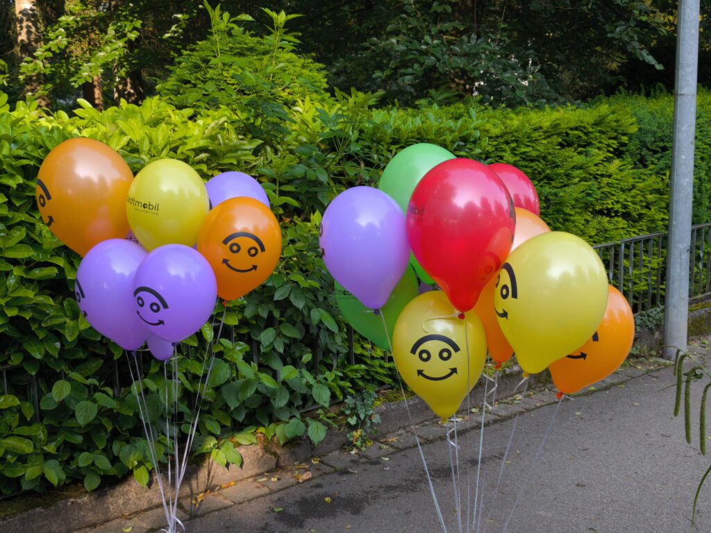 Luftballons mit dem StadtMobil-Smiley